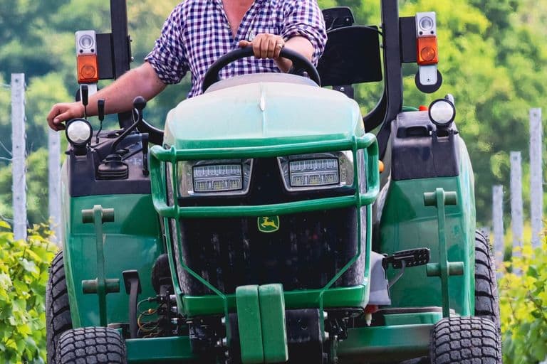 John Deere 2038R stone burying and seeding Burcombe estate vineyard
