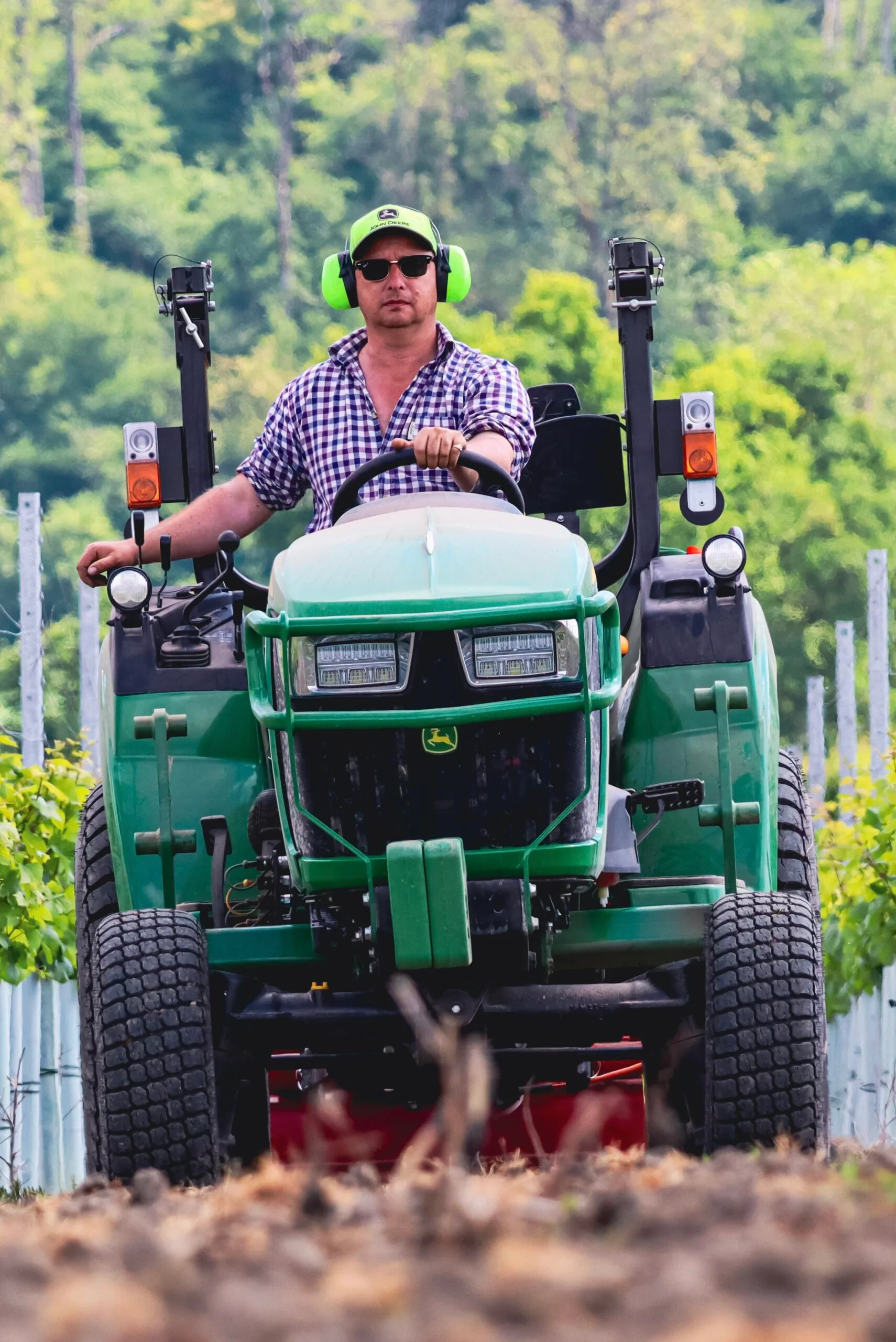 John Deere 2038R stone burying and seeding Burcombe estate vineyard